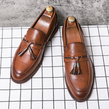 Mocasines de piel con borlas